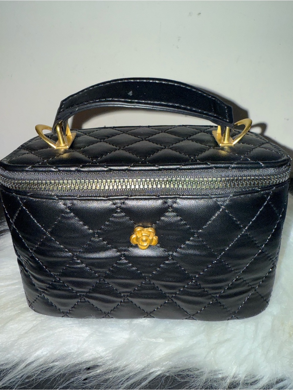 Black Quilted Top-Handle Cosmetic Case with Gold Accents